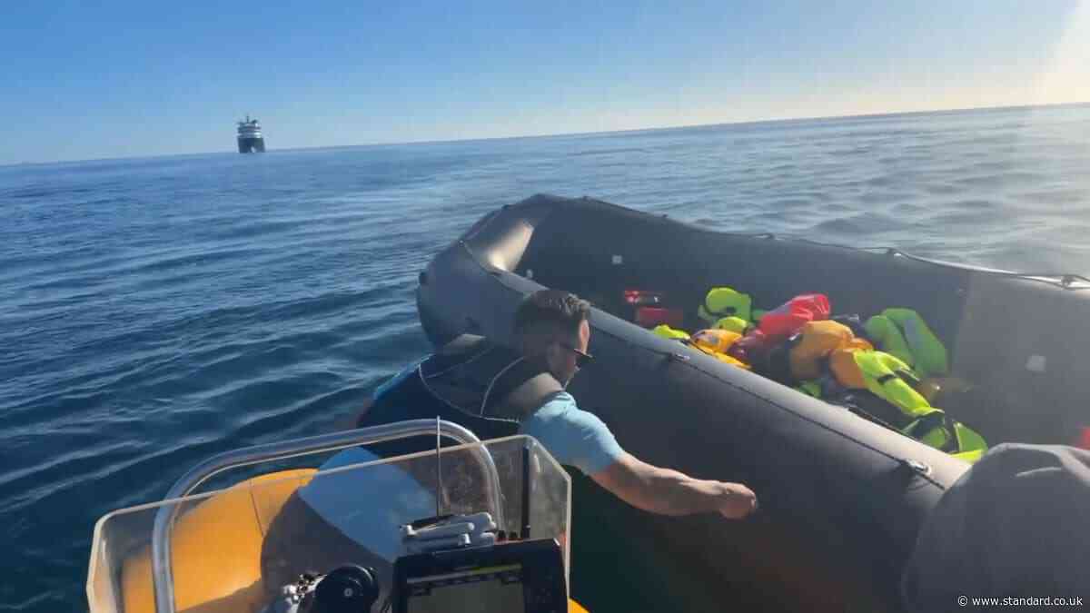 Anti-migrant activist Danny Tommo slashes dinghy in the Channel with rescuer onboard