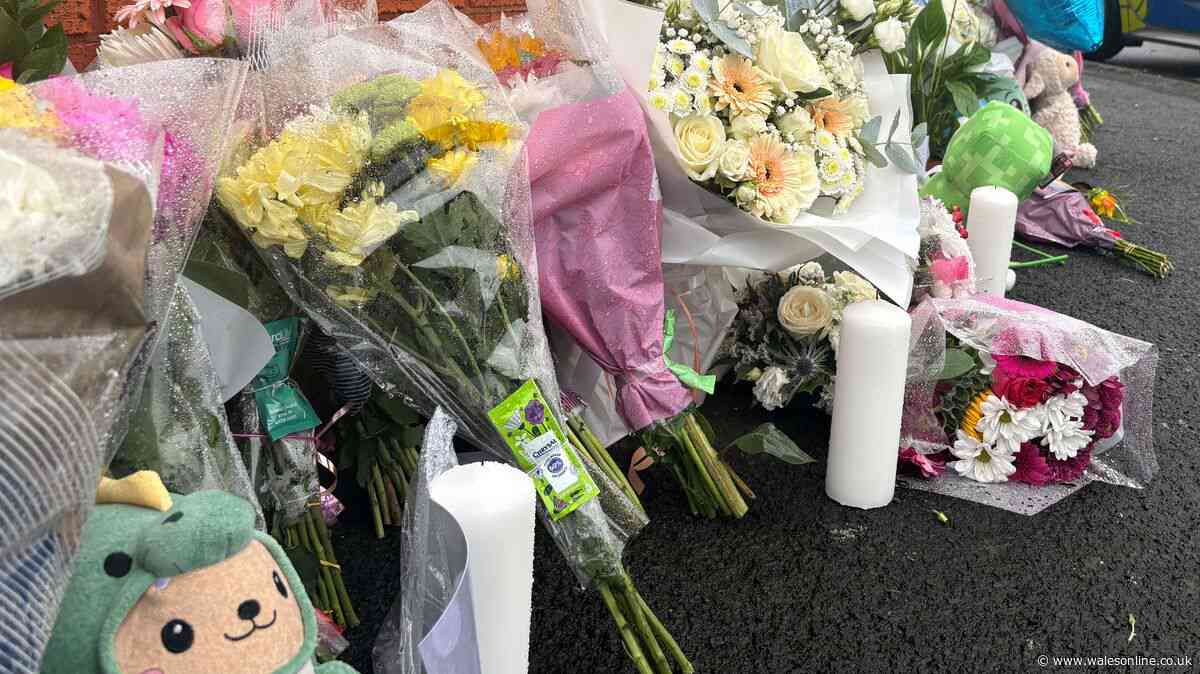 Flowers at site of horror house fire that killed woman and three children