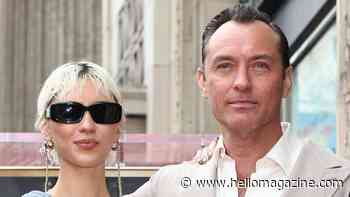 Jude Law's model daughter steals the spotlight in ultra-mini bridal dress – and bleached pixie cut