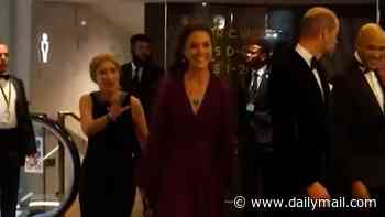 That was close! Moment Princess of Wales narrowly avoids being tripped up at premiere of Tom Cruise's Digger - after charity boss accidentally stands on the back of her gown