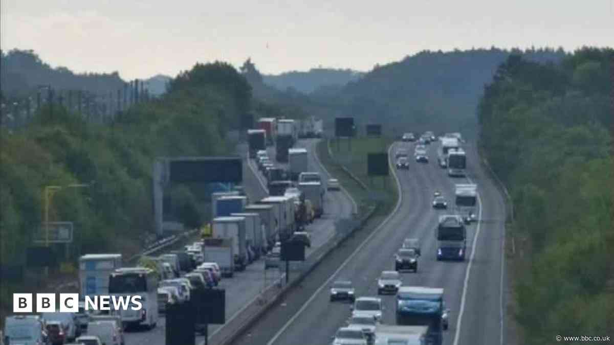 Section of M20 closed after crash and fire
