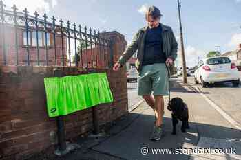 Signs in rudely named street fixed with concrete to stop tourists stealing them