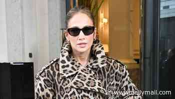 Jennifer Lopez, 57, takes a walk on the wild side as she steps out in a leopard print mini-skirt and jacket at Milan Fashion Week