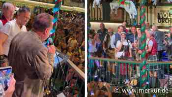 Wiesn-Besucher zücken prompt Smartphones: Weltstar betritt Festzelt-Bühne – und gibt Versprechen ab