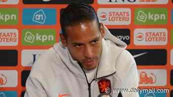 Virgil van Dijk embroiled in tense spat with Dutch reporter who accused Liverpool star of 'betraying' the  national team after World Cup failure - forcing press officer to intervene