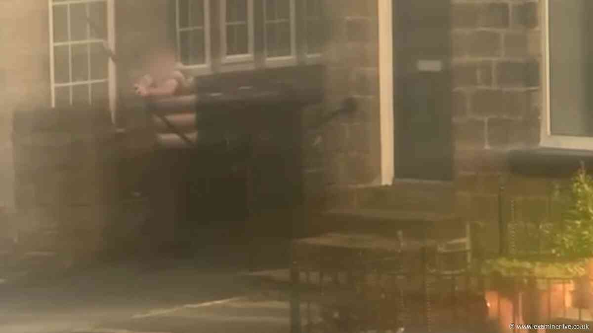Terrified gasps of 'oh god' heard as man shoots bow and arrows at traffic in Huddersfield village