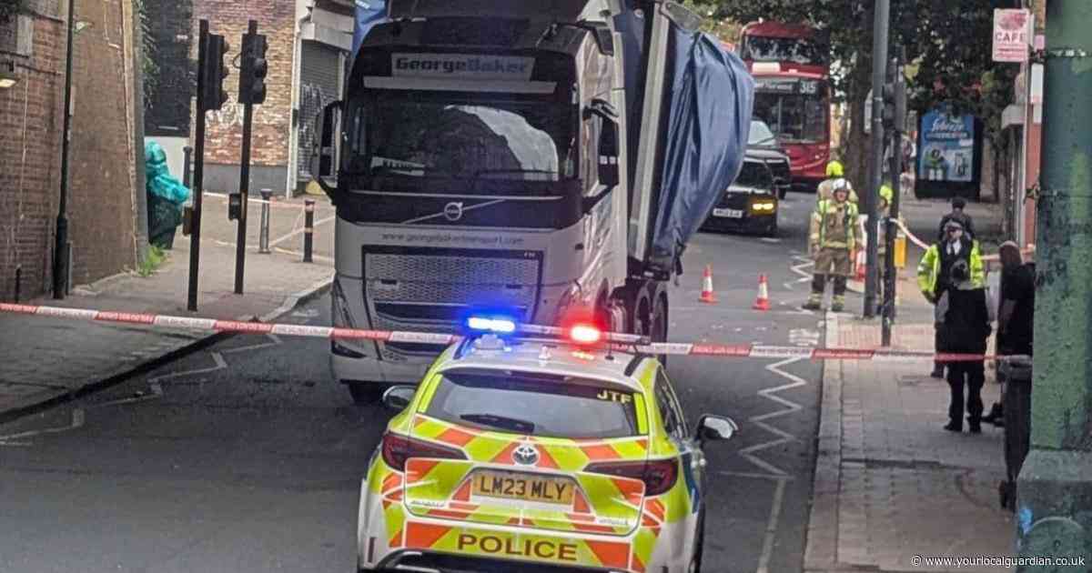 Lorry strikes bridge causing south London high street to close
