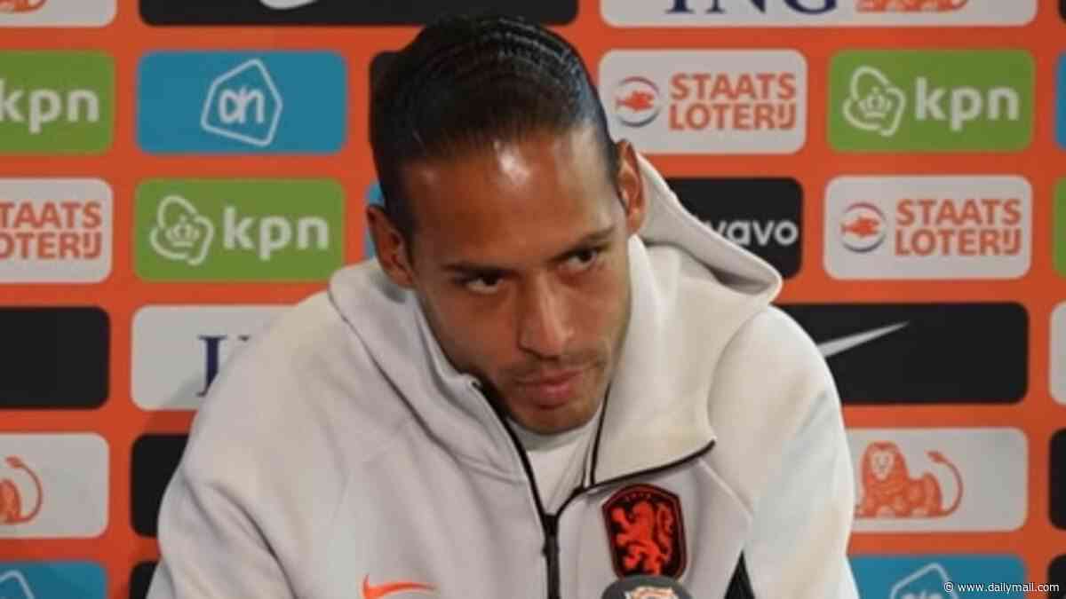 Virgil van Dijk embroiled in tense spat with reporter who accused Liverpool star of 'betraying' the Netherlands after World Cup failure - forcing press officer to intervene