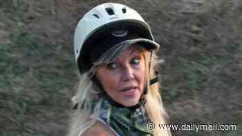 Heather Locklear, 64, and boyfriend Lorenzo Lamas, 68, enjoy romantic horse riding date... as he finalizes divorce from sixth wife