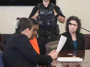 Albany woman accused of stabbing husband arraigned on murder charge