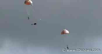 British Royal Air Force jet crashes in Wales during training, narrowly missing buildings