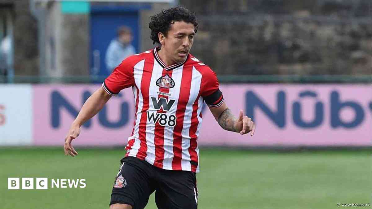 Footballer faces court over driving offences