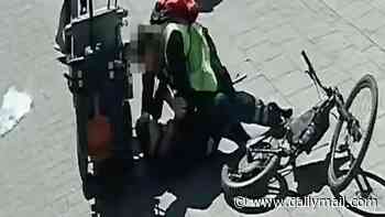 Takeaway takedown! Moment police disguised as food delivery driver and street cleaner pounce on knife suspect