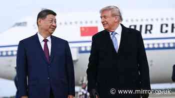 Donald Trump greets Xi Jinping with rare gesture as China says two should be 'partners'