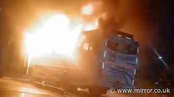 At least 9 dead after fire rips through moving bus and terrified passengers jump from windows