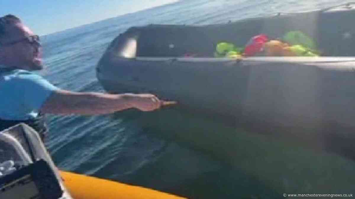 Police launch probe over clip of far-right activist Danny Tommo slashing dinghy in English Channel with knife