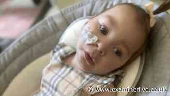 Parents' heartbreak as they bury 'special' baby on day she was due to be christened