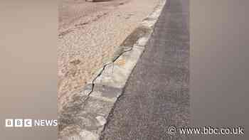 Engineers carrying out repairs to sea wall