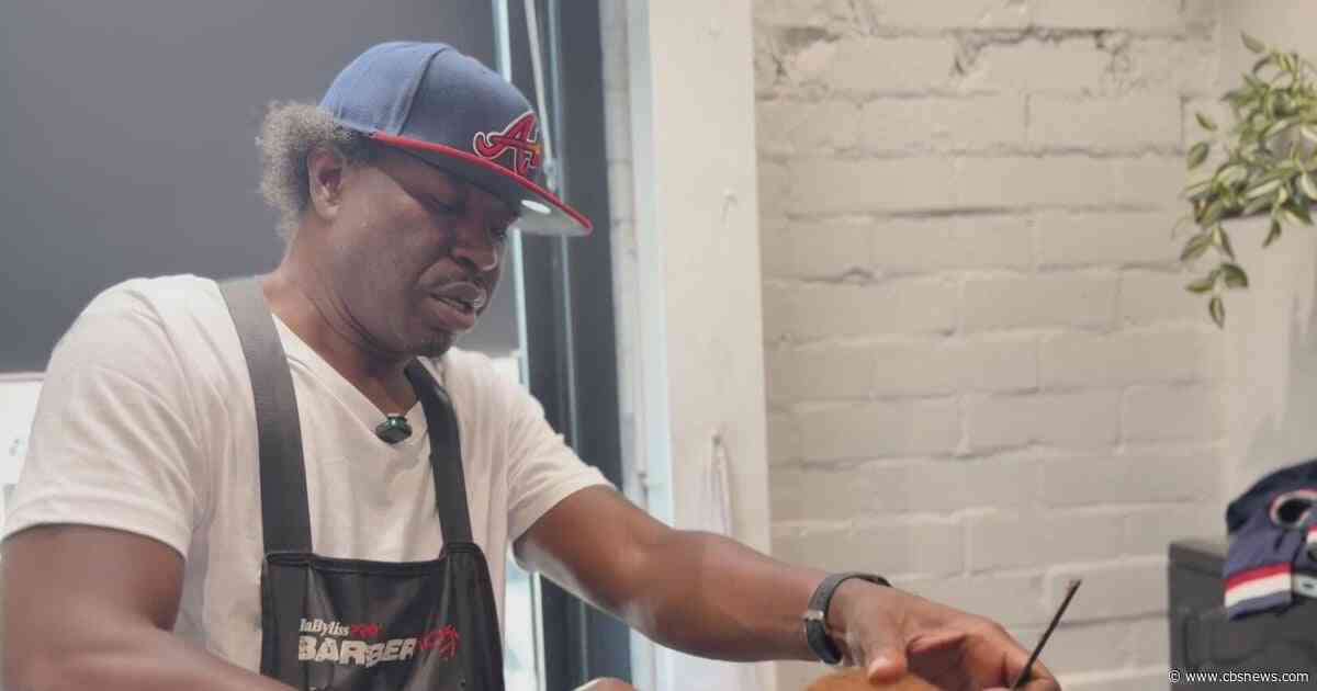 Atlanta master barber uses haircuts to restore confidence and community