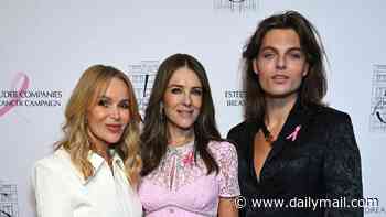 Elizabeth Hurley is joined by lookalike son Damian and Amanda Holden as she hosts Estée Lauder breast cancer fundraiser lunch