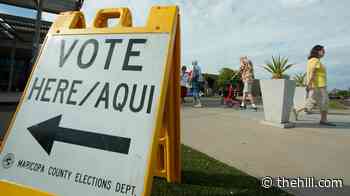 Democrats sue Trump administration over threats to deploy federal agents to polls 