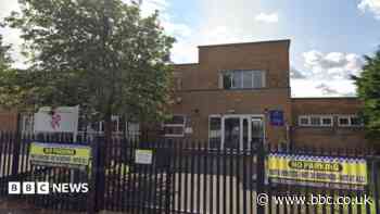 Man arrested after school receives threatening call