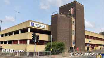Last car left in condemned multi-storey to go