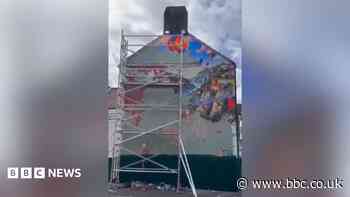 Criticised AI mural of city on pub wall removed