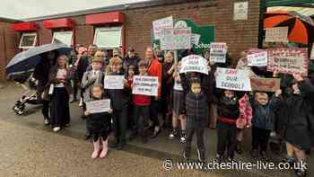 School closure protesters march on council building - only to find it shut