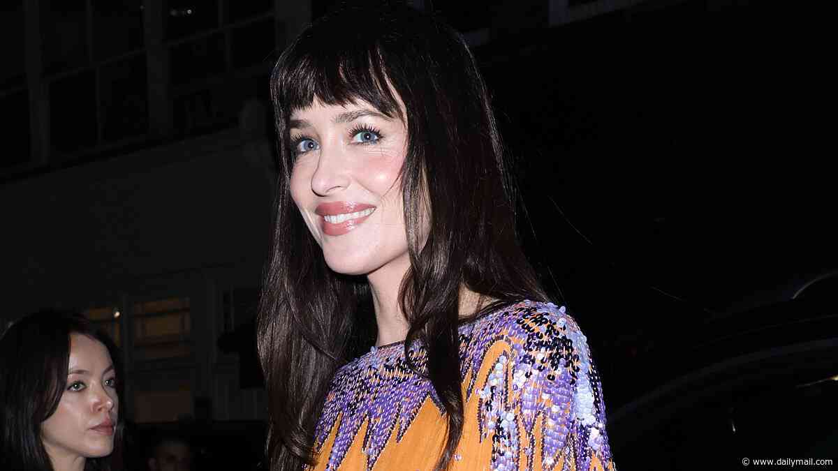 Dakota Johnson wears a bold orange and purple dress to attend Valentino Beauty event in London after the Verity premiere