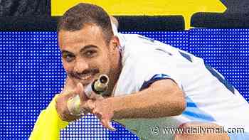 Israel footballer pleads his innocence as he's sent off for 'GUN GESTURE' celebration - but little-known rule shows the referee was right