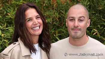 Katie Holmes, 47, and her boyfriend Jason Bard Yarmosky, 39, cosy up in matching ensembles at Tod's event for Milan Fashion Week