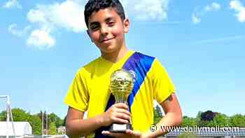 Schoolboy, 11, was killed by train at crossing while 'distracted by his phone', inquest rules