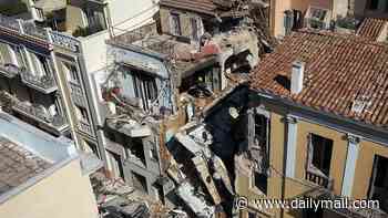 Tourists among at least five missing as huge explosion destroys building in historic Athens district