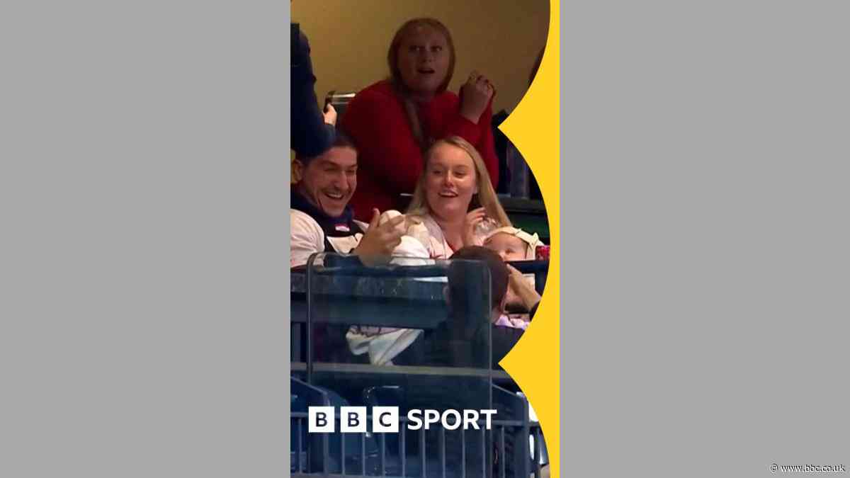 Mind the twins! Fan shows father's instinct whilst carrying baby