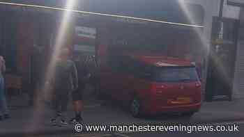 Police descend on Westhoughton street after car ploughs into Italian restaurant