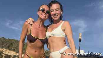 Alan Shearer's bikini-clad daughter Chloe celebrates her hen do with sister Hollie as she models 'Mrs Young' sarong and downs drinks on boat trip