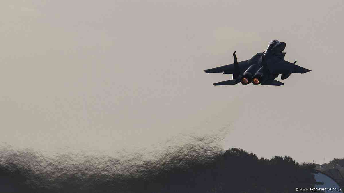 At least 13 dead after military plane crashes 'on residential plot'