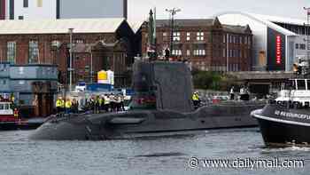 Britain's new £1.65billion nuclear submarine finally launches after 13 YEARS under construction