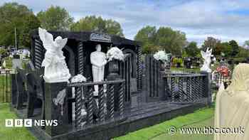 Huge memorial to dad, 51, erected in cemetery