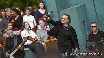 U2 rock their old school with surprise concert to mark 50 years