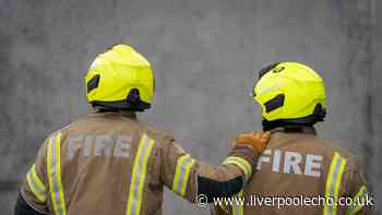 Tranmere fire LIVE: Ten fire engines tackle car garage blaze as person and two dogs rescued