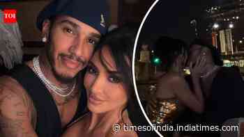 Kim and Lewis kiss in front of Eiffel Tower - PICS