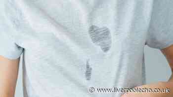 Remove tough oil stains by covering in 2 common household items before washing