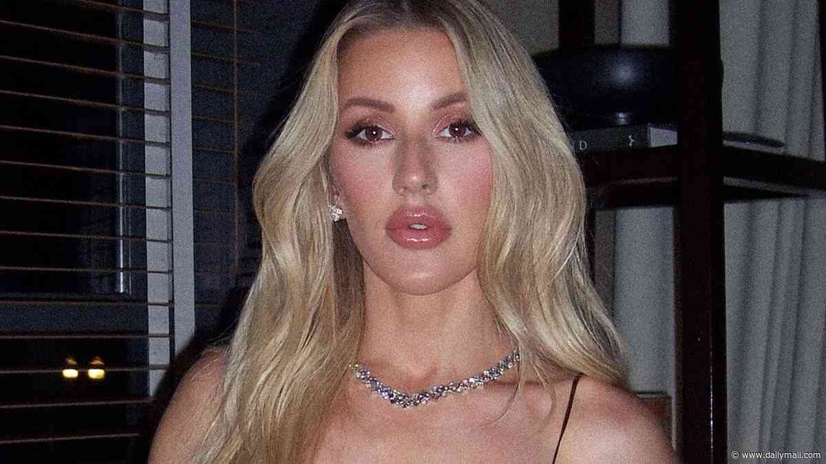 Ellie Goulding wows in a satin lace minidress as she poses for sexy snaps after fans branded her an 'icon' for simple response to Ed Sheeran row