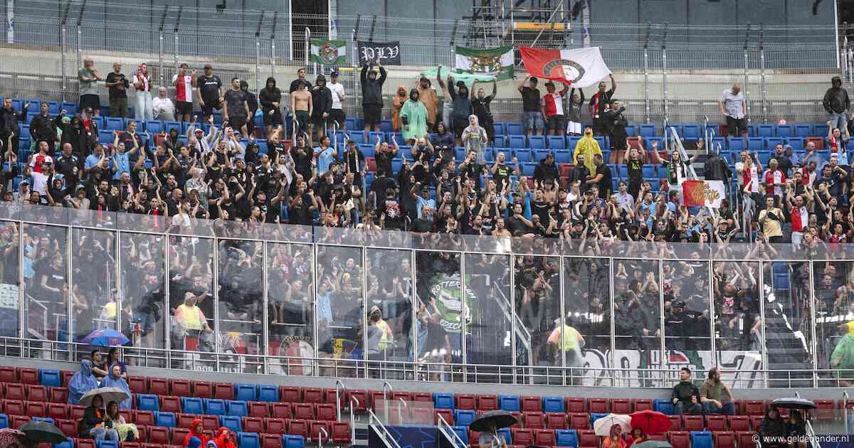 UEFA straft Feyenoord voor racisme en bekergooien bij Barcelona