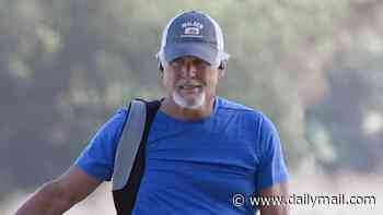 '80s heartthrob who starred on Falcon Crest and General Hospital is spotted on rare outing... can you guess who he is?