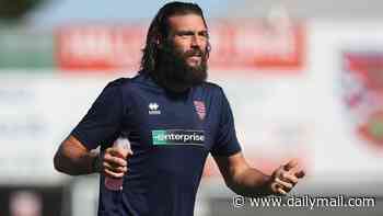 Andy Carroll is seen for the first time since his sexual assault revelation as he returns to the football pitch