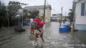 Powerful storm causes widespread flooding, outages in northeast U.S.