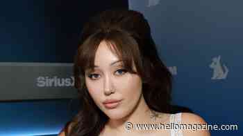Noah Cyrus shows off curvy figure in string bikini during overseas trip